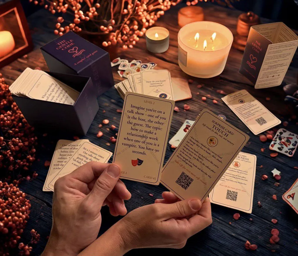 hands holding cards over game